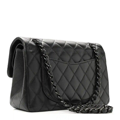 Quilted shoulder bag with flap pocket and chain strap, dark black leather