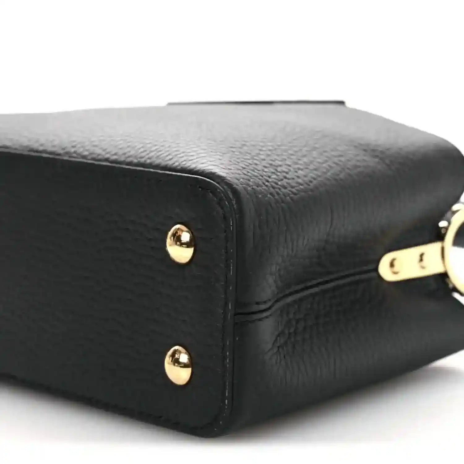Louis Vuitton black leather mini handbag corner with two gold-toned base studs