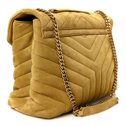 Chartreuse suede quilted satchel with YSL monogram, gold chain, and top flap