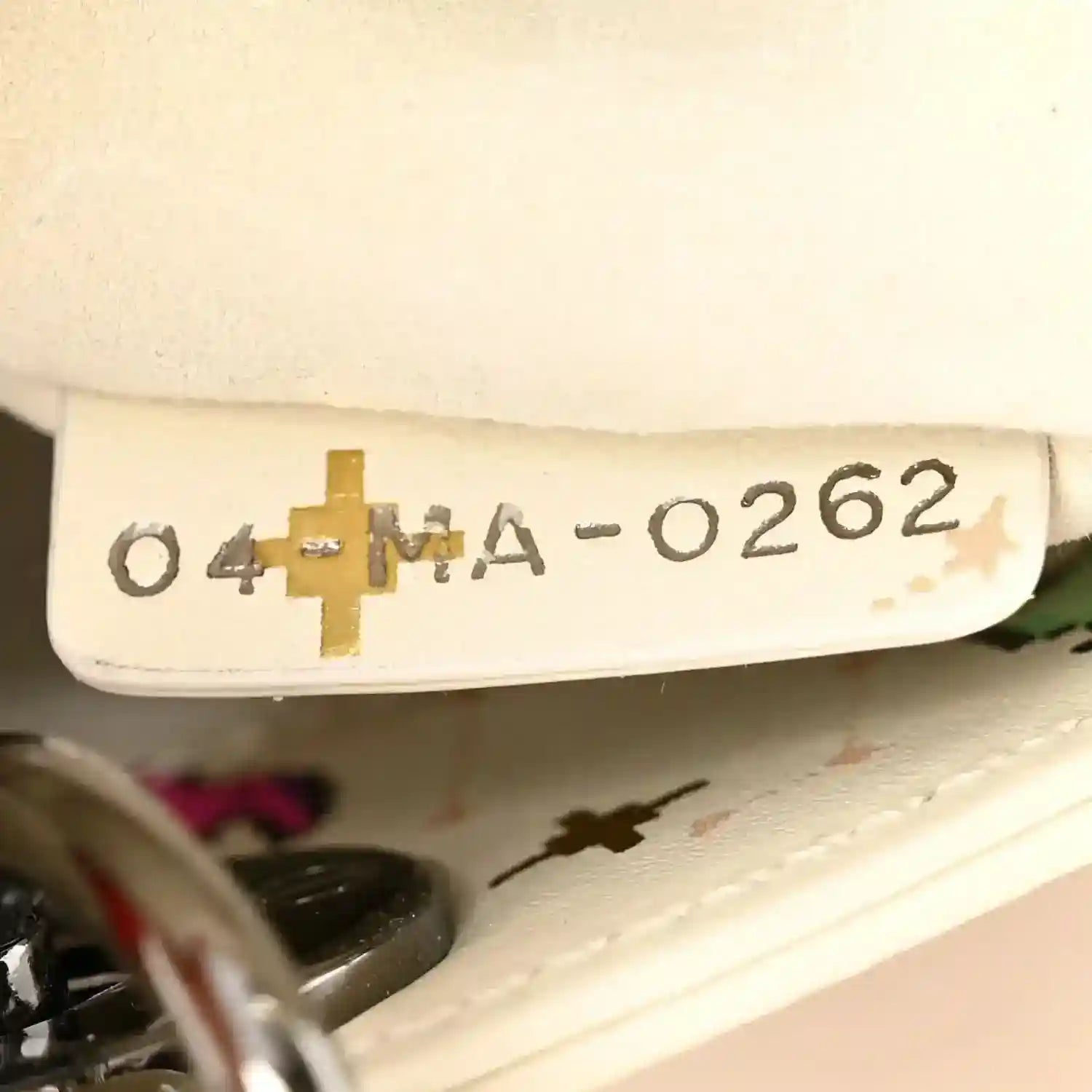 Mini Lady Dior bag interior date/serial stamp on white leather