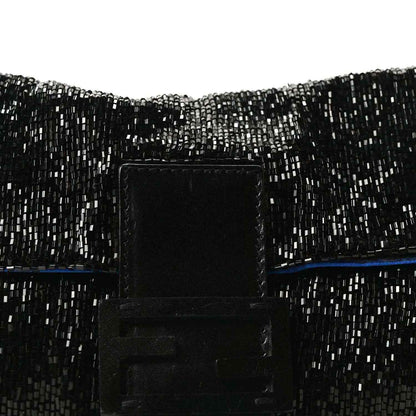 Black beaded baguette front with leather tab clasp and blue trim