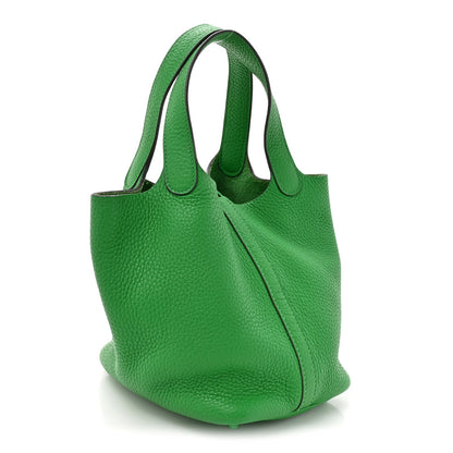 Green leather Picotin Lock 18 PM tote bag with dual top handles and curved sides