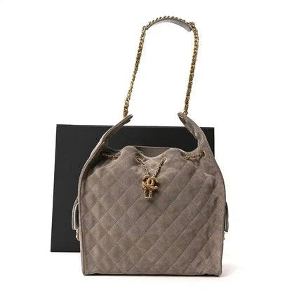 Chanel quilted medium suede shoulder bag in dark grey with chain handles