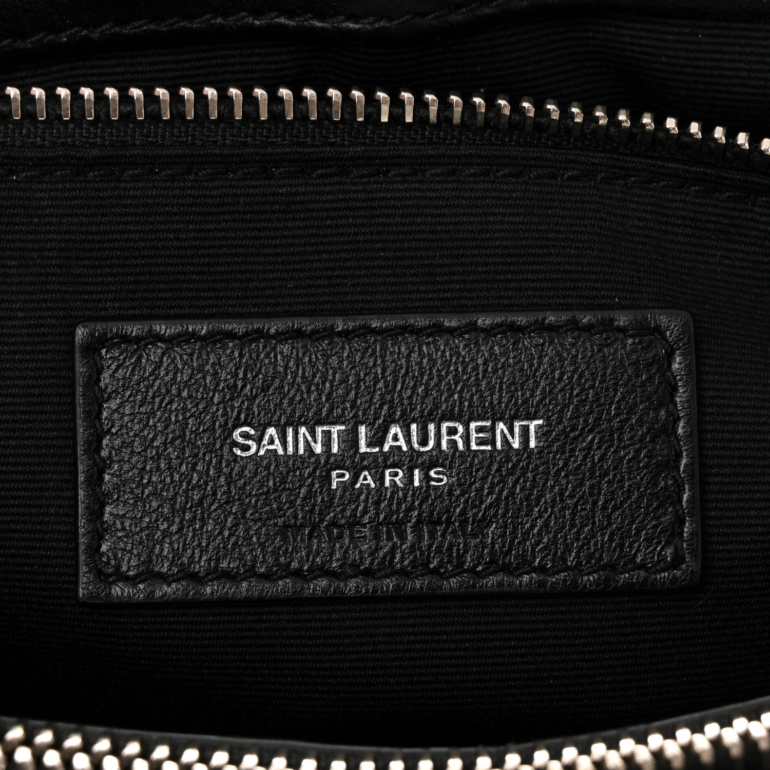 Saint Laurent Paris leather patch on black satchel with silver zipper