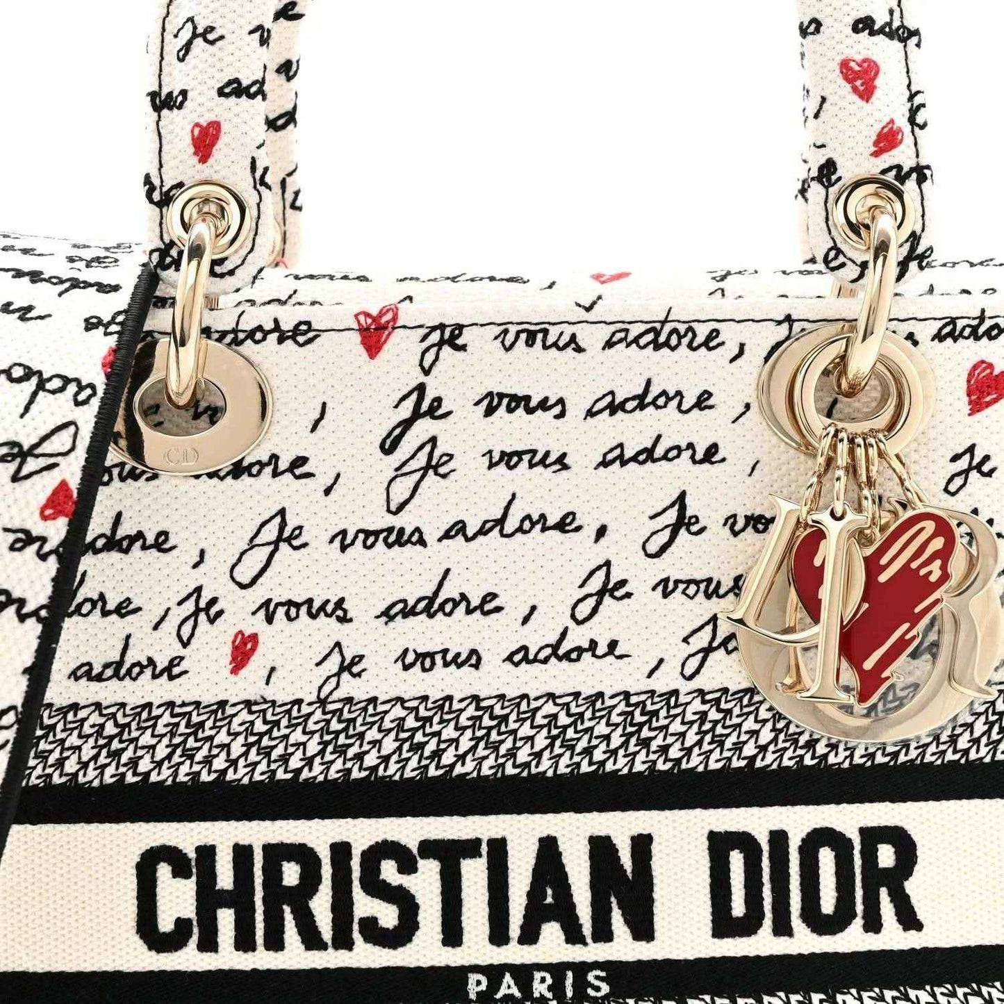 Christian Dior canvas handbag top with ring handle hardware, “Je vous adore” print