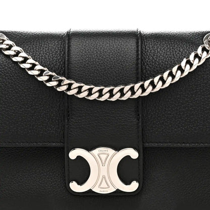 Black leather shoulder bag front with silver C clasp and chain strap