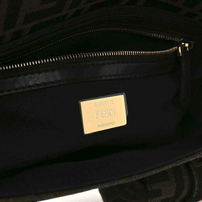 Fendi baguette bag interior with Fendi label and zippered lining, dark jacquard fabric