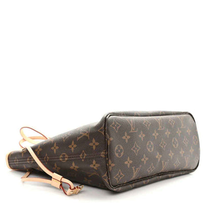 Louis Vuitton monogram canvas tote bag, side view with shoulder strap attached