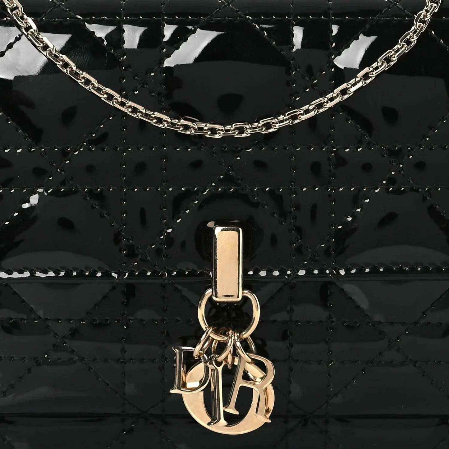 Black patent cannage Lady Dior pouch front view with Dior clasp and chain link