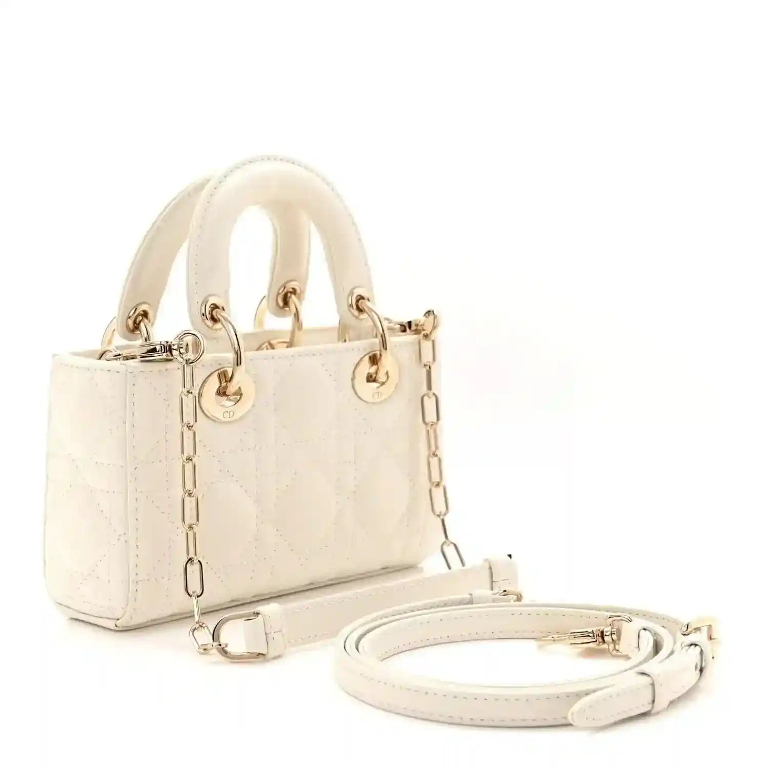 Cream micro lady D-Joy bag with top handles, gold chain strap, and front cannage