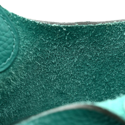 Close-up of green pebbled leather texture on the tote
