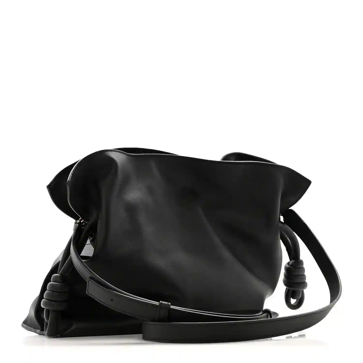 Black calfskin Flamenco knot clutch with braided leather shoulder strap