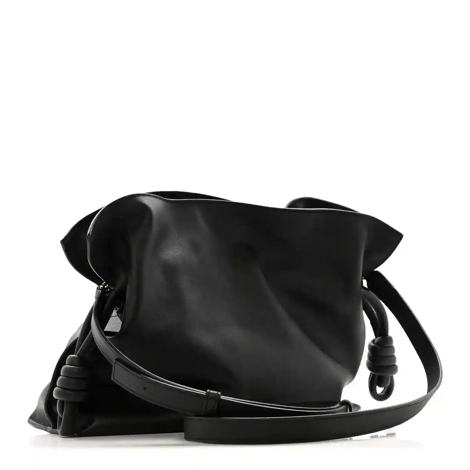 Black calfskin Flamenco knot clutch with braided leather shoulder strap