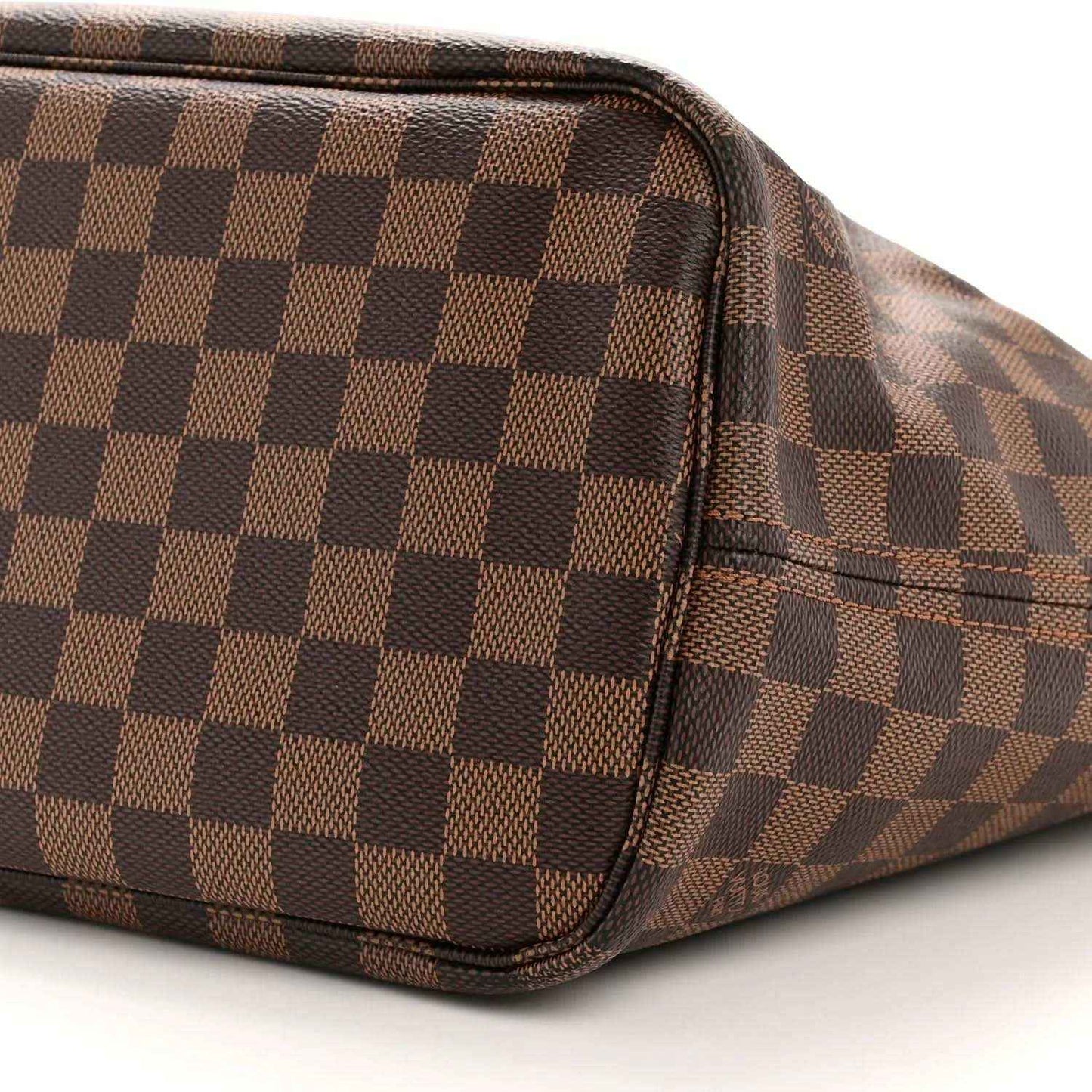 Damier Ebene tote bag corner with brown check canvas and dark leather edge piping