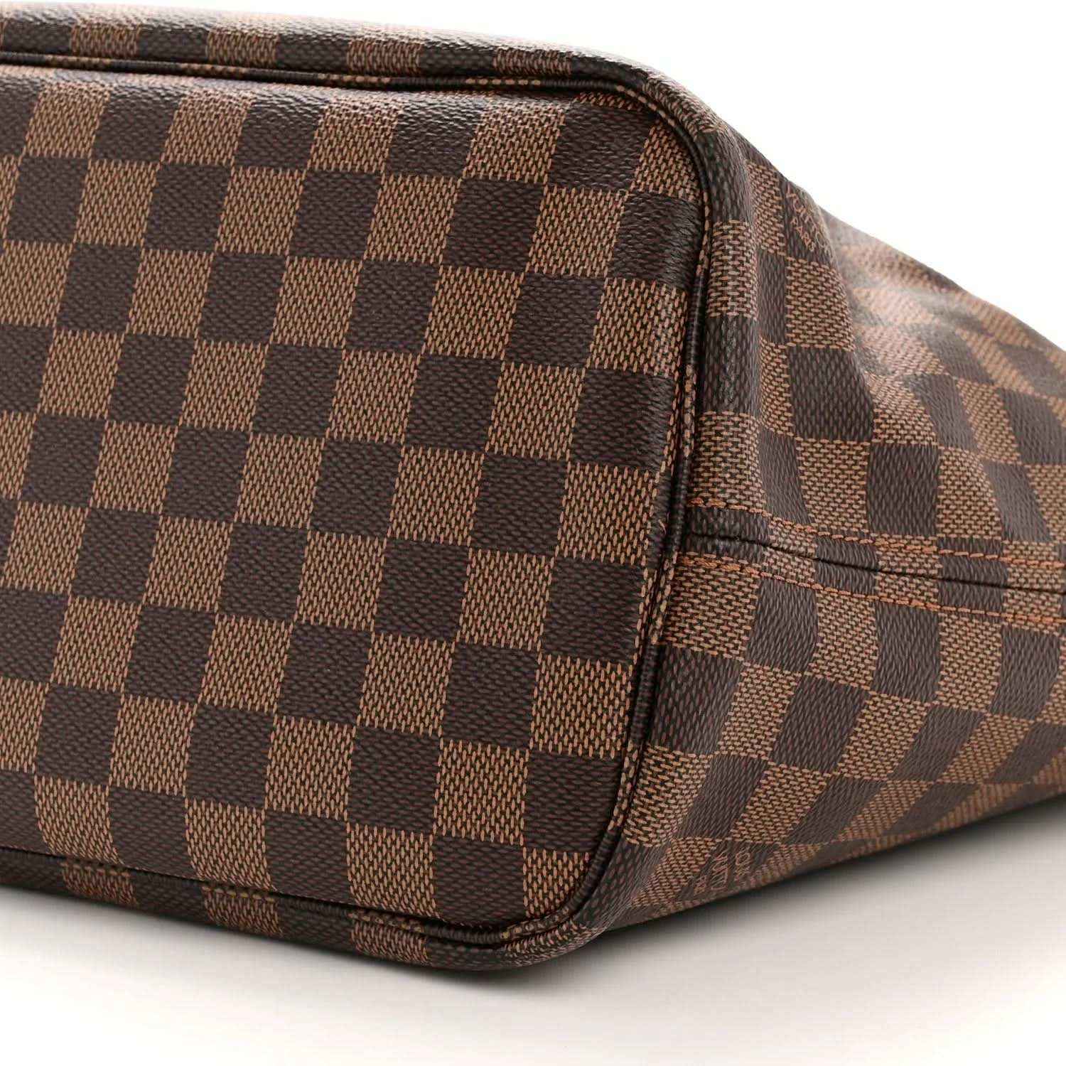 Damier Ebene tote bag corner with brown check canvas and dark leather edge piping
