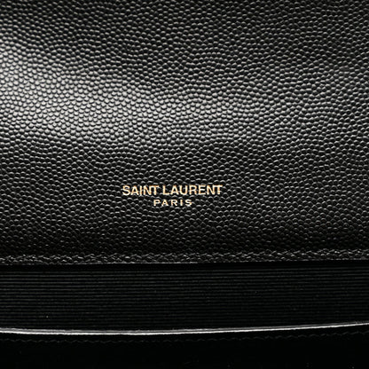 Black embossed satchel panel with centered Saint Laurent Paris logo