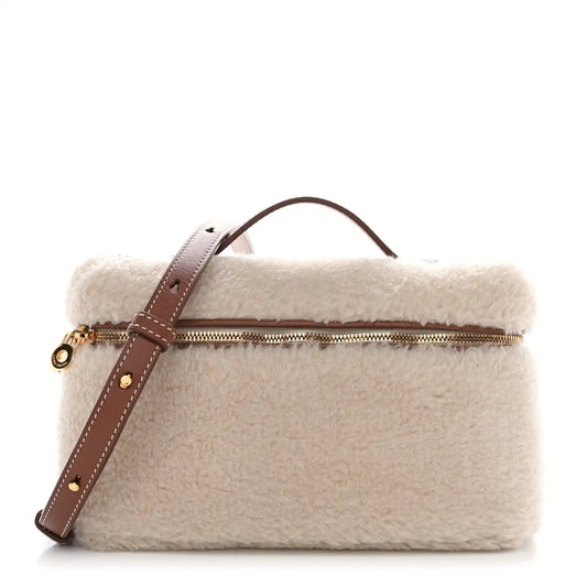 Cream faux-fur calfskin pouch with brown leather strap and gold zipper closure