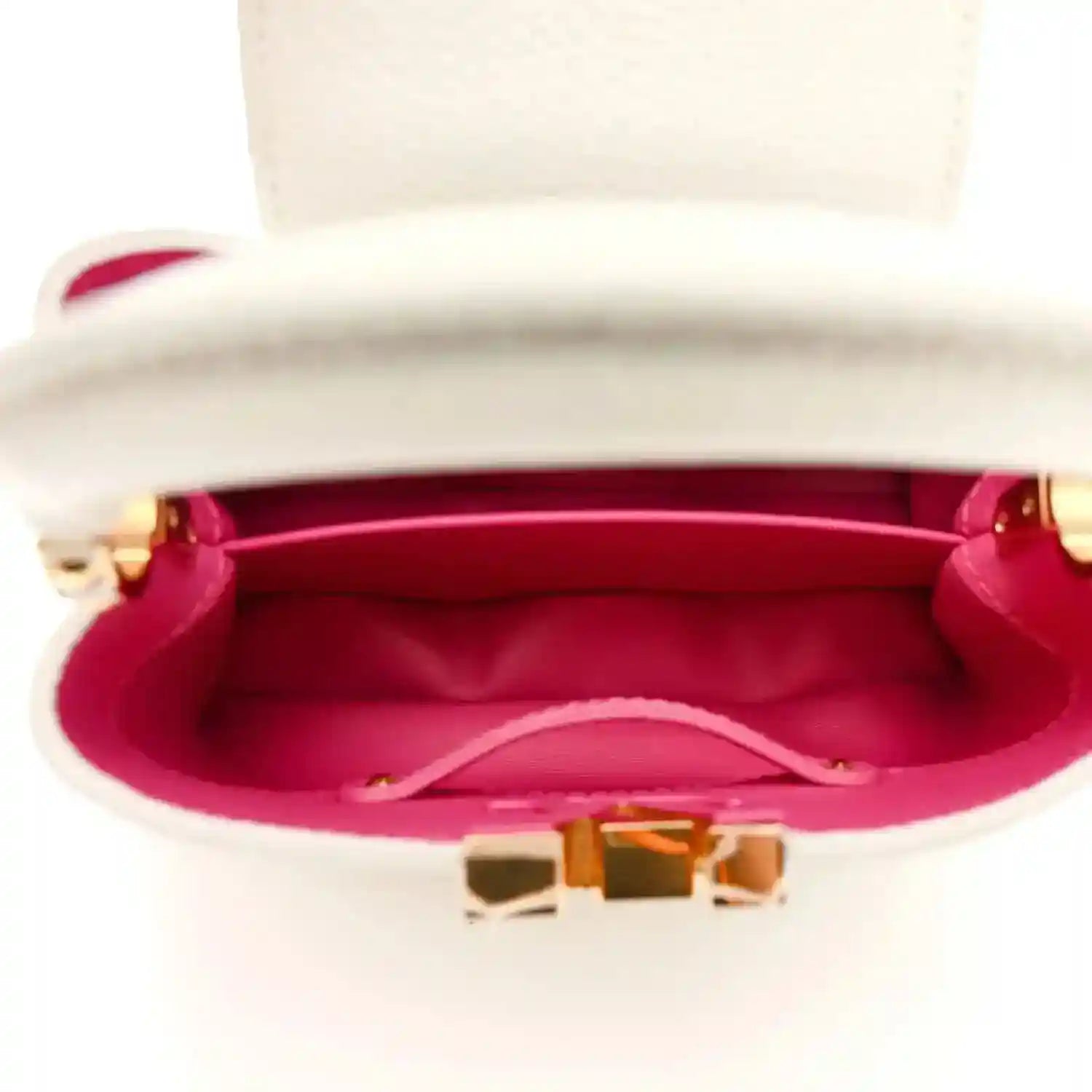 Louis Vuitton Capucines mini handbag interior, white exterior with magenta lining