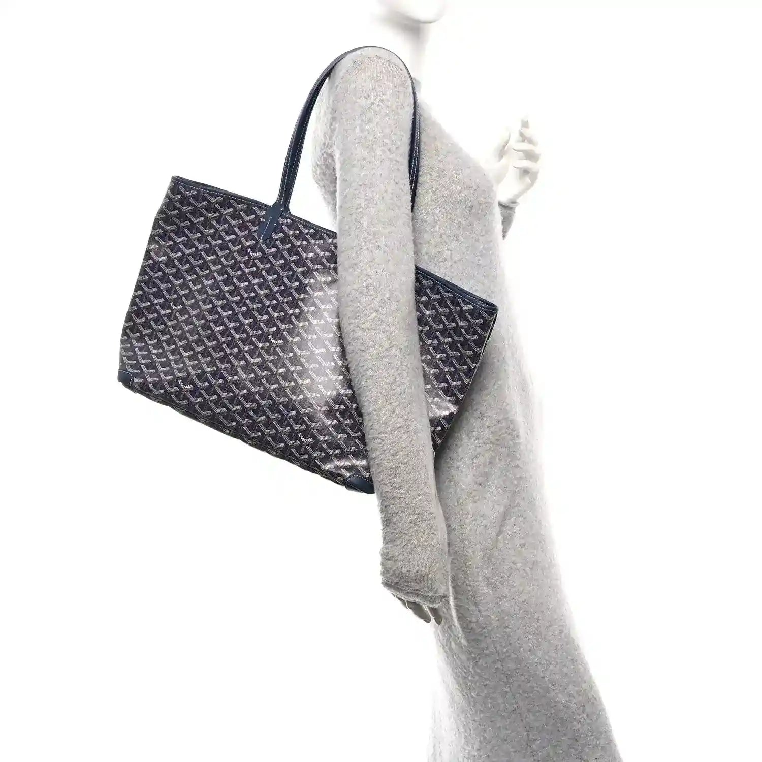 Navy Goyardine Artois MM tote bag side view with structured shape and top handle