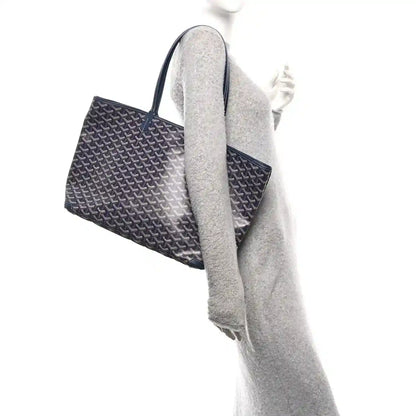 Navy Goyardine Artois MM tote bag side view with structured shape and top handle