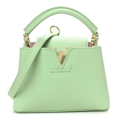 Green leather mini handbag with gold V lock