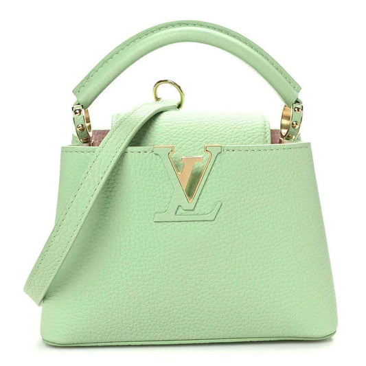 Green leather mini handbag with gold V lock