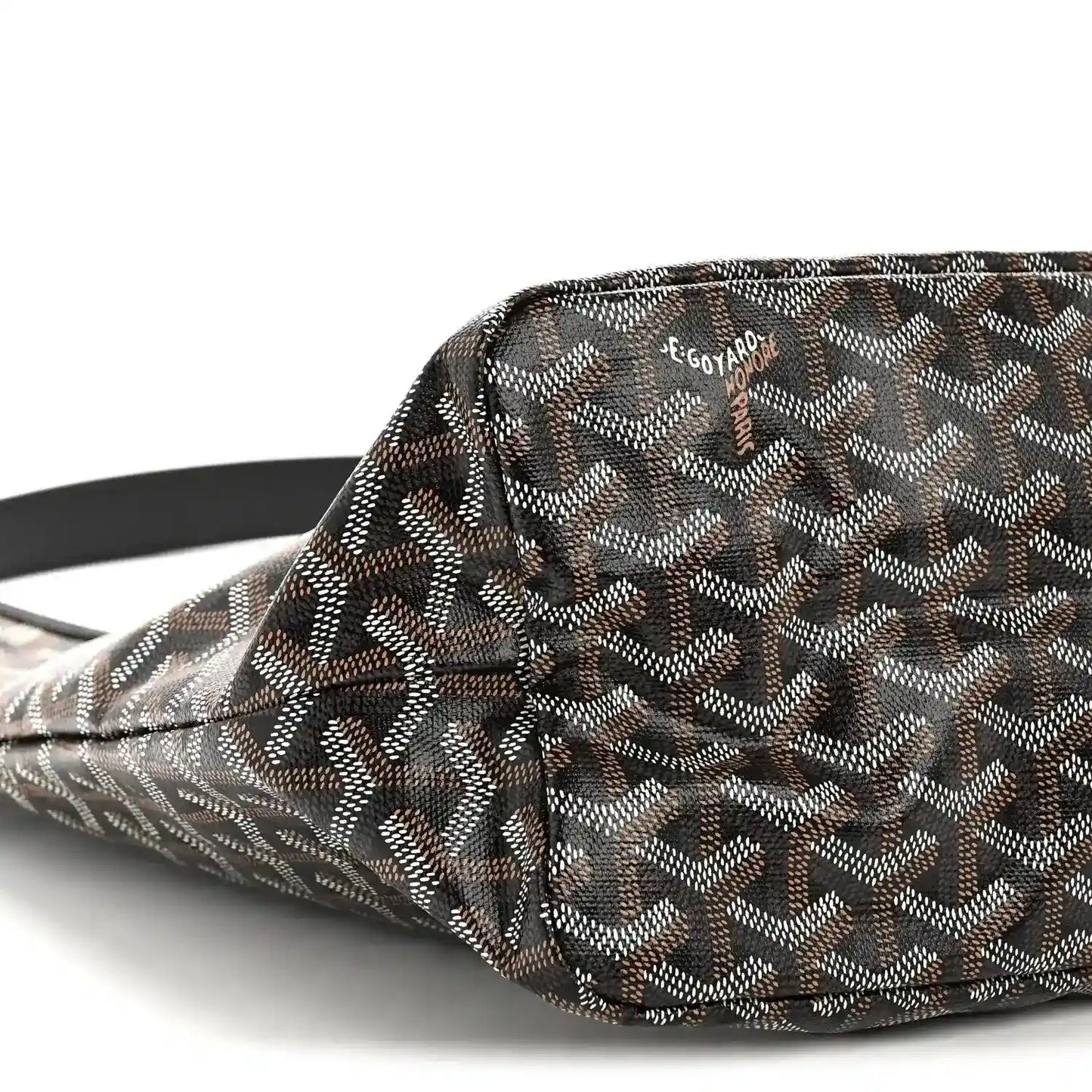 Goyard hobo bag close-up of front corner showing monogram pattern and black strap