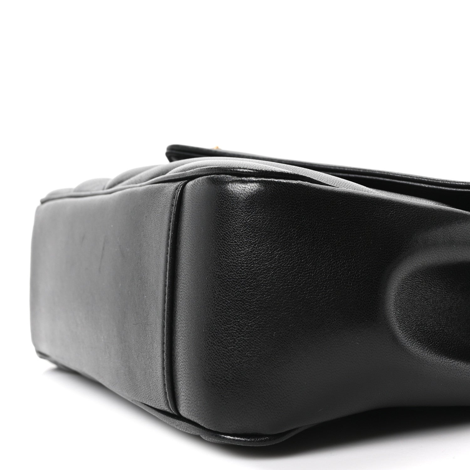 Black medium shoulder bag with structured corners and leather texture