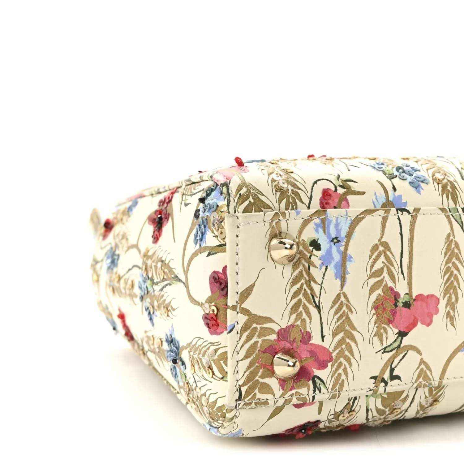 Embroidered floral tote bag with structured sides and cream base