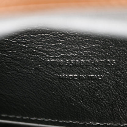 Black leather interior text 'MADE IN ITALY' on pouch lining