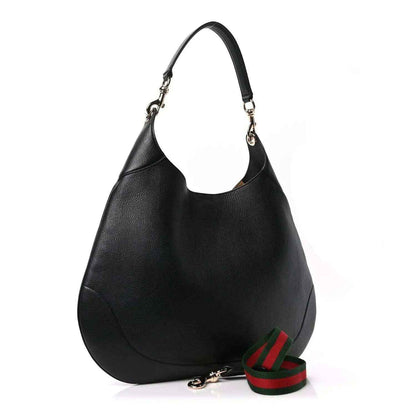 Black maxi hobo bag with green red web strap and metal chain shoulder straps