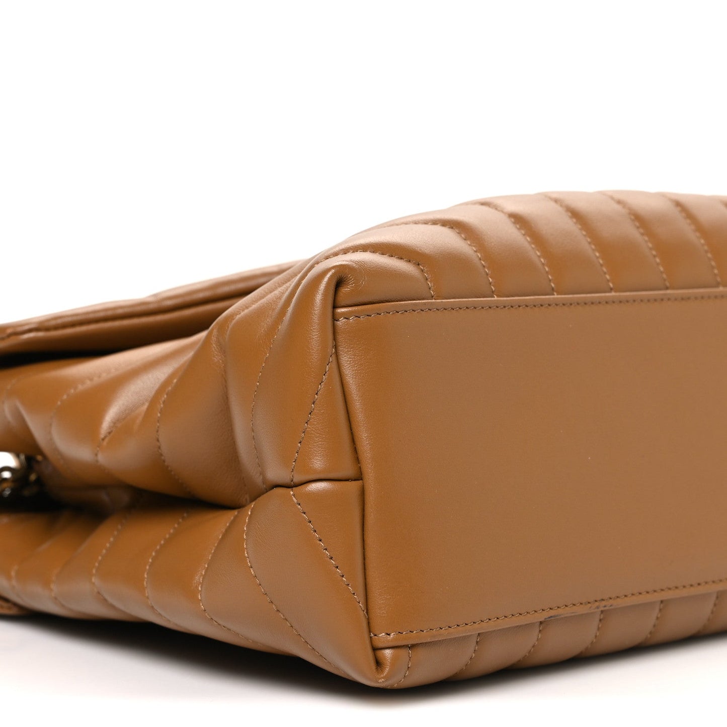 Tan quilted leather satchel end with zipper closure and channel stitching