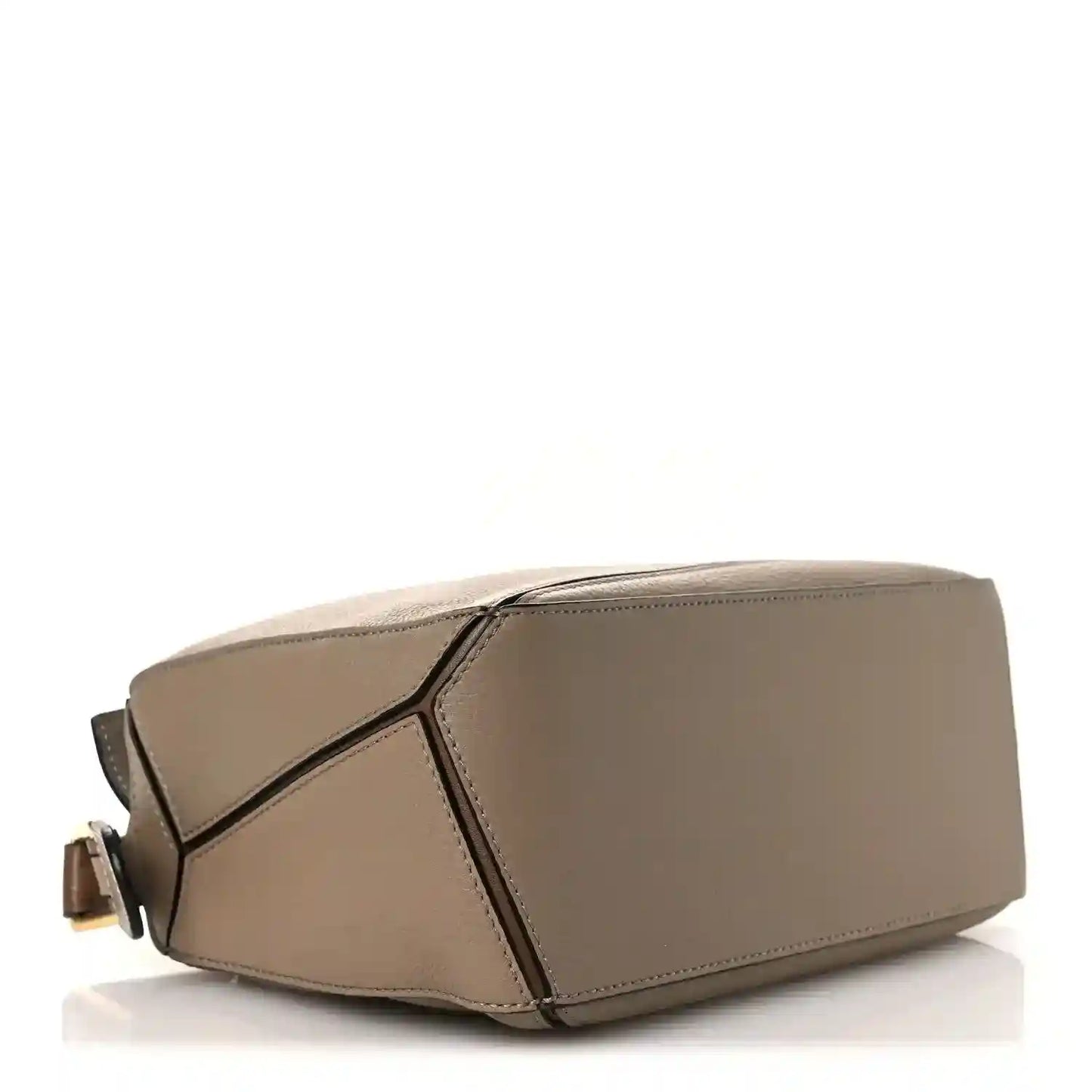 Small Puzzle bag angled view, sand leather with geometric panel detail