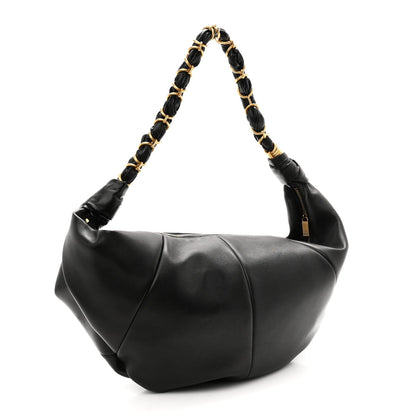 Black lambskin hobo bag with braided chain handles and front center seam