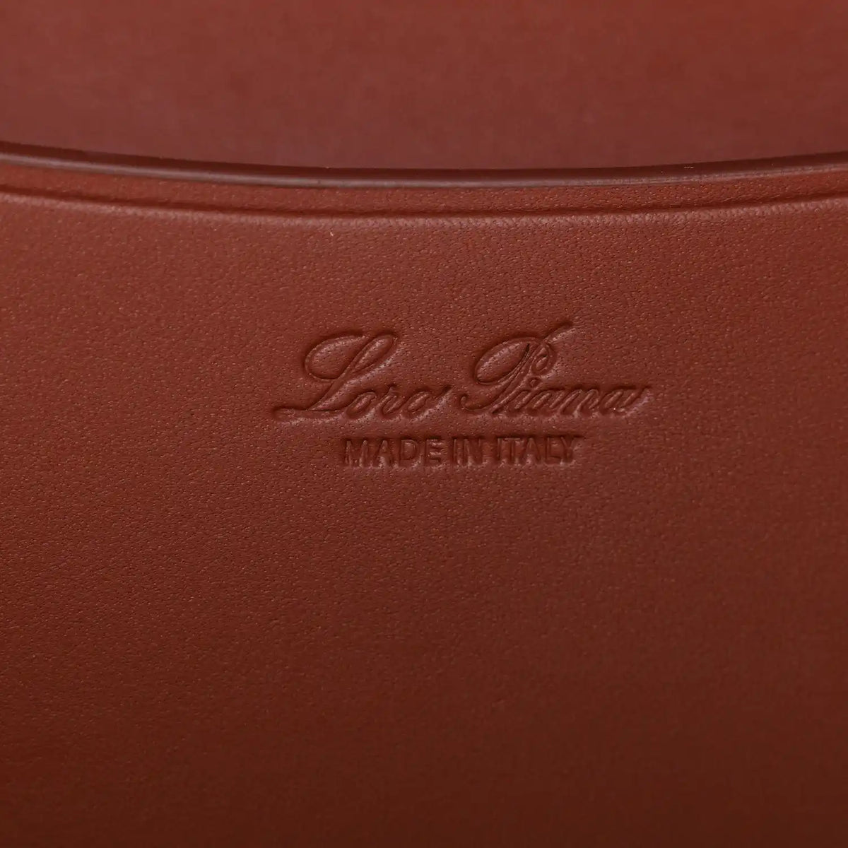 Loro Piana embossing and Made in Italy on dark brown calfskin