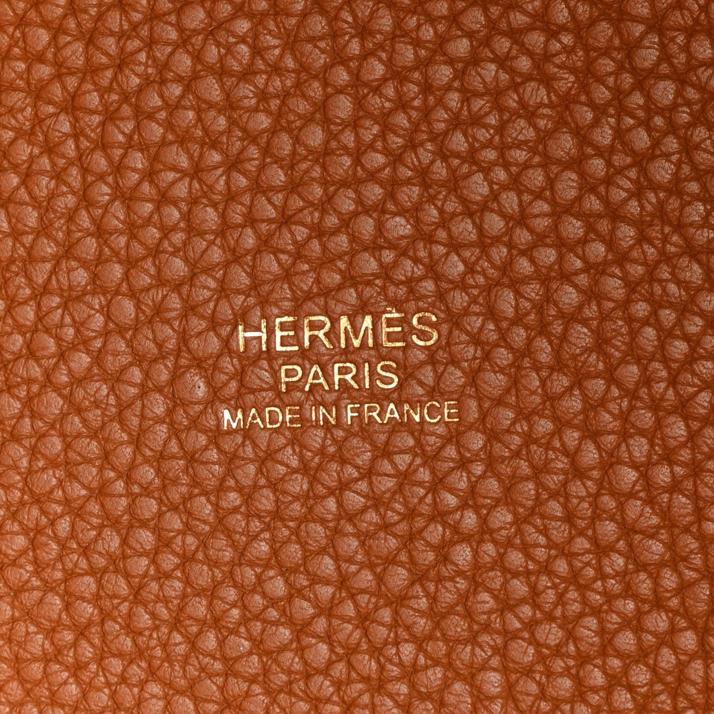 Stamped leather with HERMES PARIS MADE IN FRANCE lettering