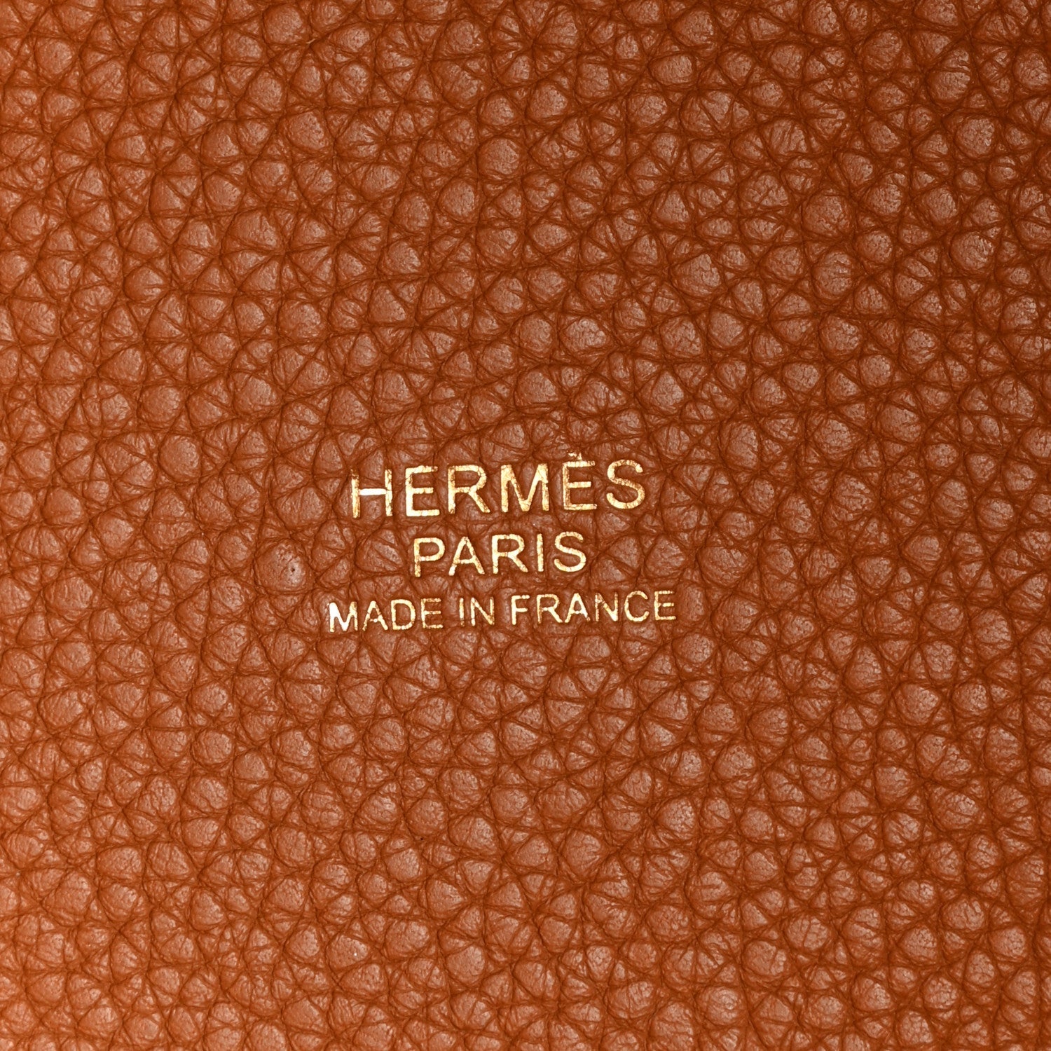Stamped leather with HERMES PARIS MADE IN FRANCE lettering