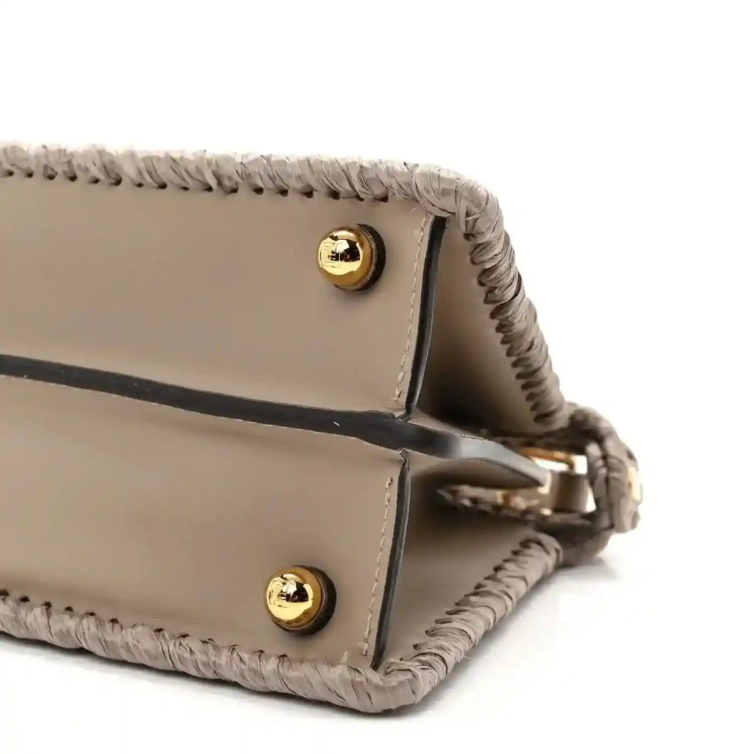 Light gray leather satchel base with gold snap buttons and woven edge trim