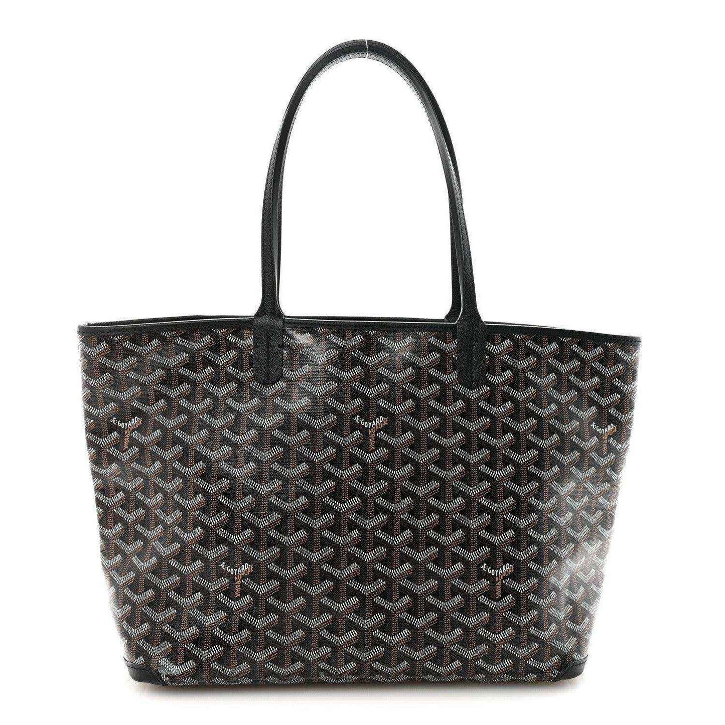 Goyardine PM tote bag in dark canvas with black handles and trim.