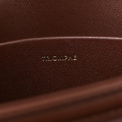 Dark chestnut leather interior with embossed CELINE logo