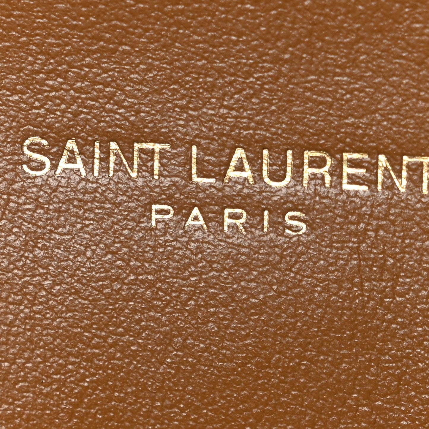 Calfskin satchel with embossed Saint Laurent Paris logo on leather