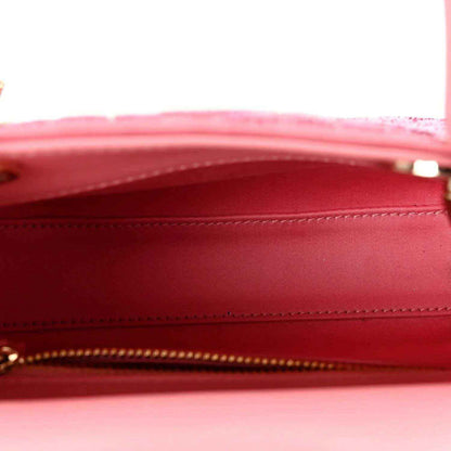 Mini Lady Dior handbag interior in pink leather with zippered opening and stitching