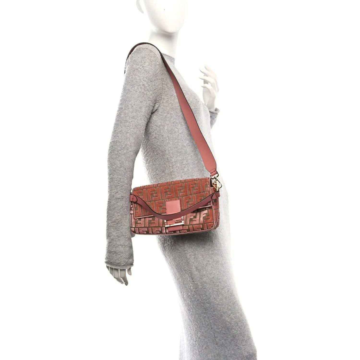 Pink velvet jacquard baguette bag worn crossbody, FF pattern with shoulder strap