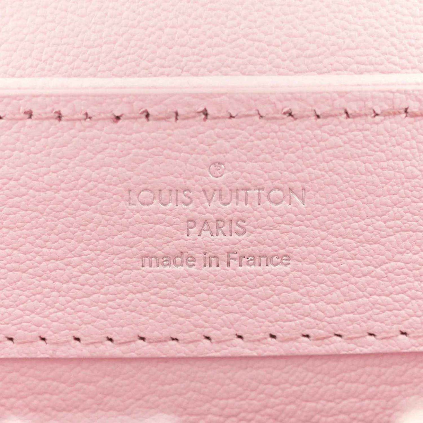 Louis Vuitton Paris logo on pale pink leather panel, made in France