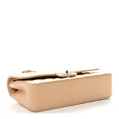 Chanel beige quilted caviar medium shoulder bag, back corner view with clasp