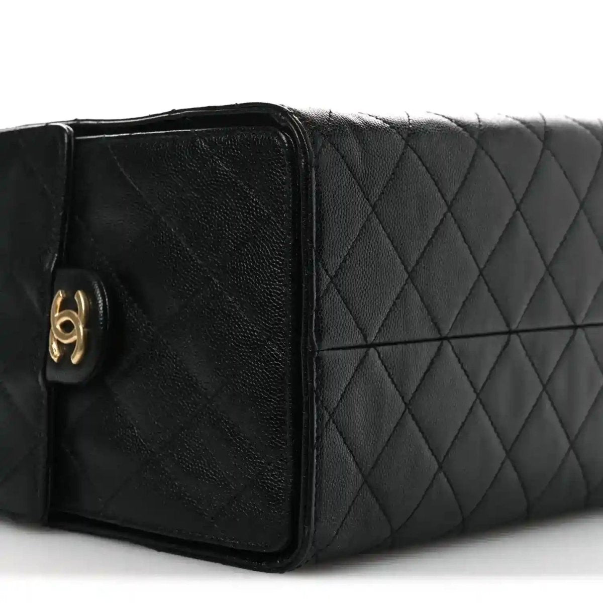 Black quilted leather handbag with front flap closure and gold hardware