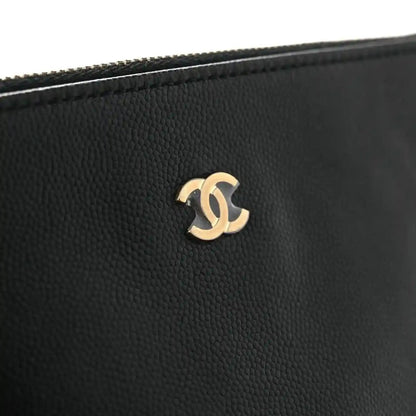 Black caviar leather handbag with gold-tone Chanel CC logo