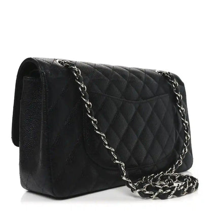 Black quilted leather shoulder bag with silver-tone chain strap and turn-lock flap