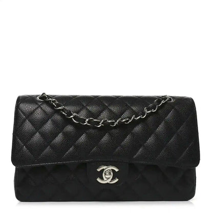 Black quilted leather Chanel flap bag with silver-tone chain strap and CC logo