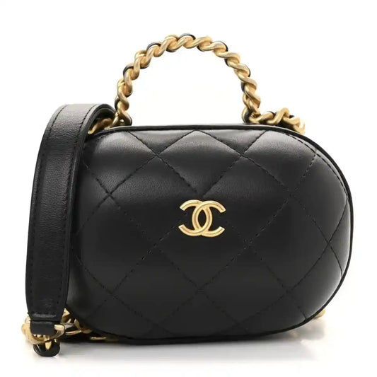 Black quilted lambskin vanity chain case with gold CC logo and top handle